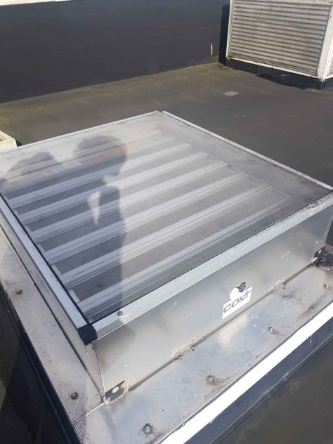fly screen installed over a air conditioner system