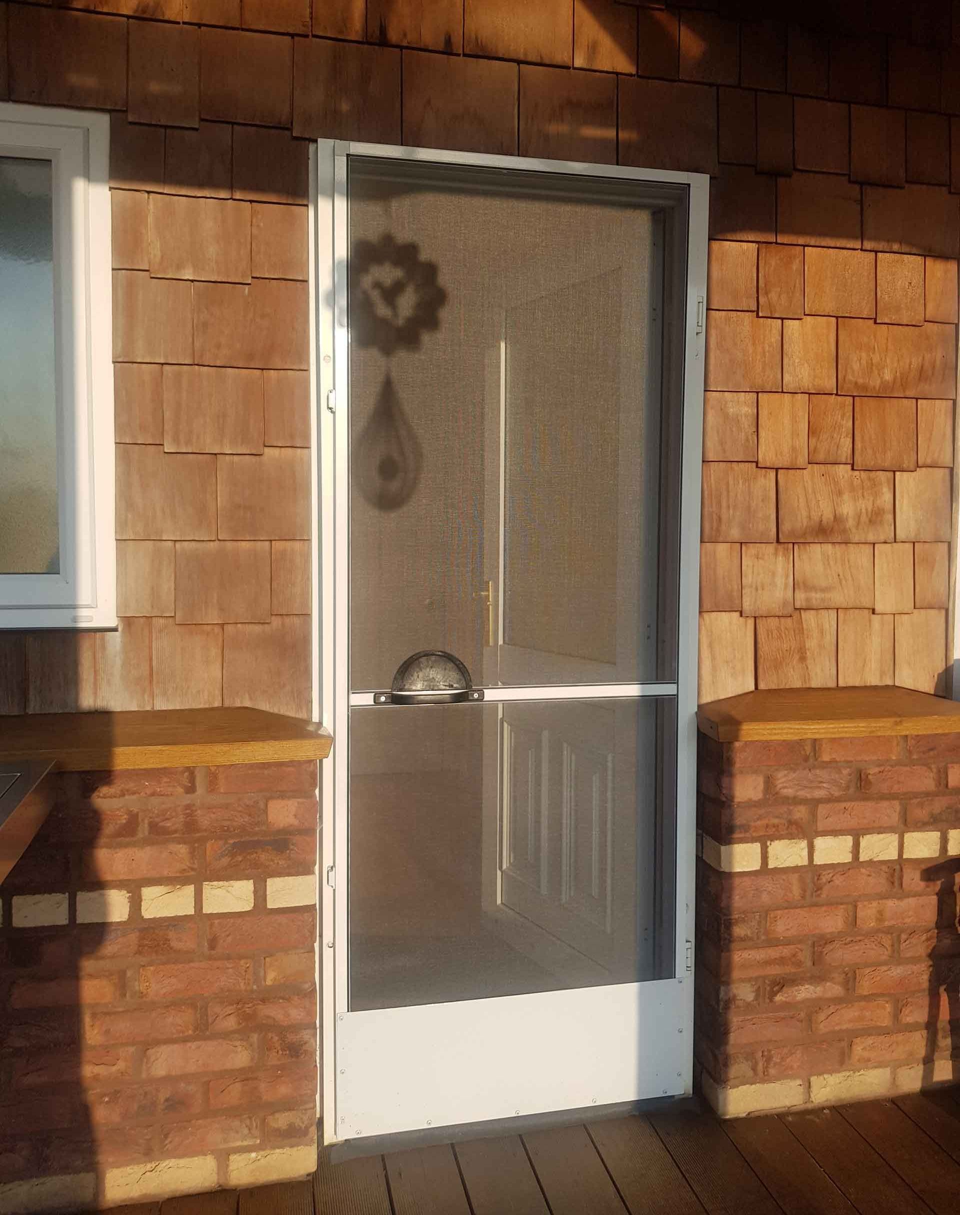 fly screen installed on a home's doorway