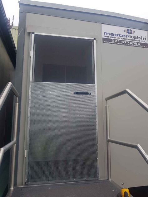 fly screen installed on a portacabin doorway