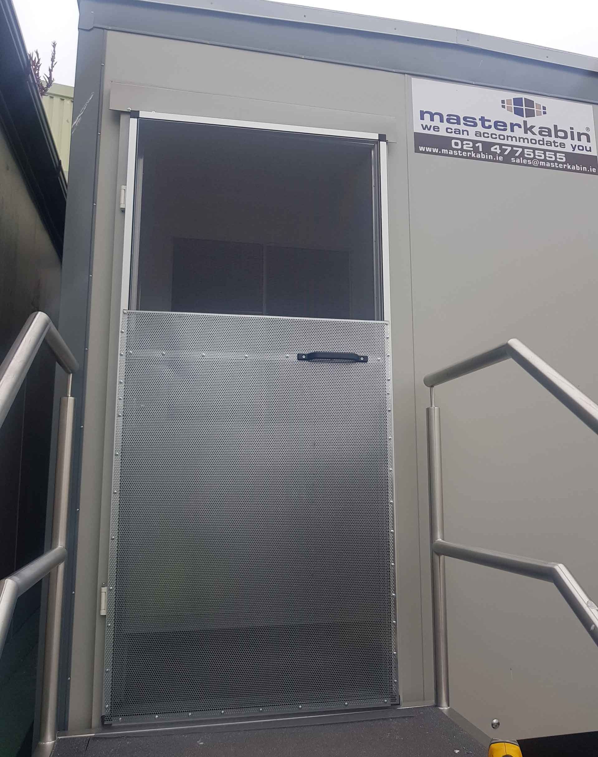 fly screen installed on a portacabin doorway