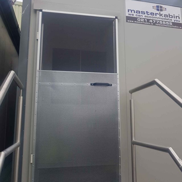 fly screen installed on a portacabin doorway