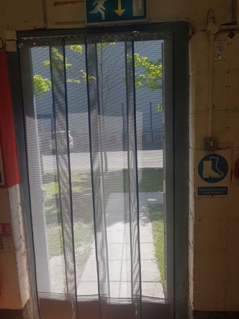 fly screens installed in a doorway