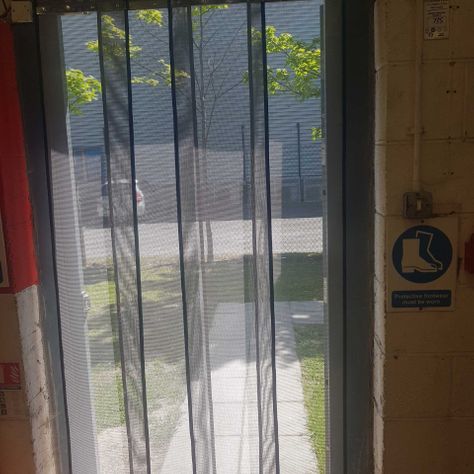 fly screens installed in a doorway