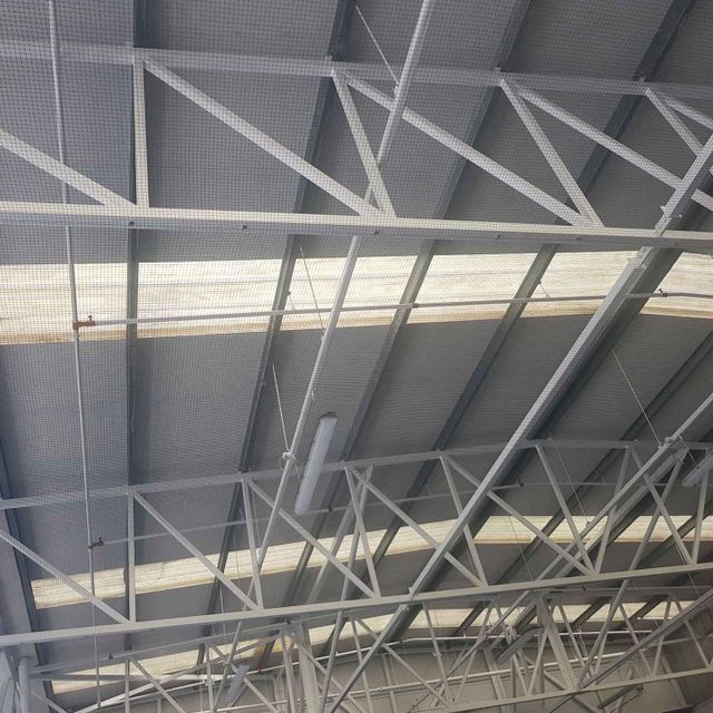 Example of transparent bird netting in a factory 